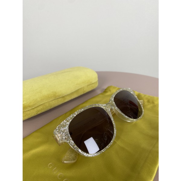 Gucci <br/> Solbriller, glimmer.