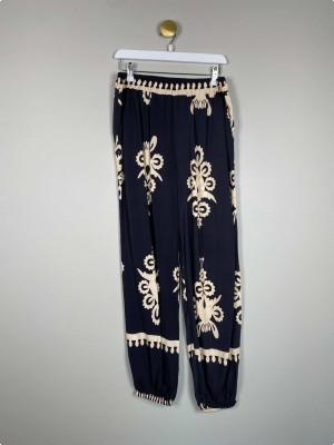 Marta str. L/XL <br/> blå bukser med beige mønster