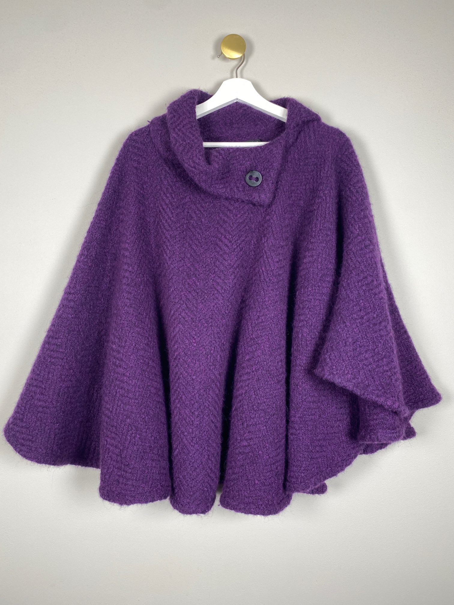 John branigan <br/b> lilla uldponcho