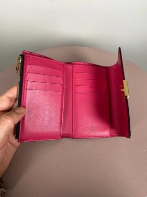 Louis Vuitton Capucines compact wallet, black